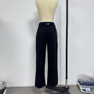 Detailed back view of high waist wide leg black denim jeans with adjustable buckle