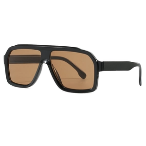 Retro oversized square aviator sunglasses with black frame and brown lenses at a 45-degree angle