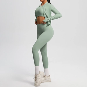 Three-piece bean green fitness set with zip jacket and high waist leggings on model