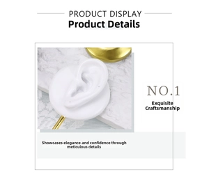 Detailed close-up of a silicone prosthetic ear model for earring and stud jewelry display