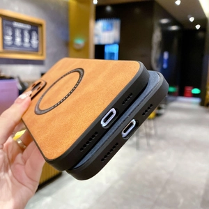 Detail of charging port and speaker cutouts on magnetic nubuck leather iPhone case