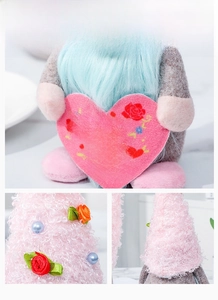 Detail of plush gnome holding 'I Love you Mom' heart with handmade ribbon roses