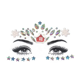Macro view of iridescent face gems with snowflake and house motifs for eye decoration