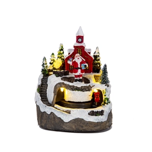 Lighted musical Christmas house with Santa and rotating train resin decoration