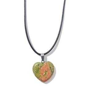 Detail of 20mm heart-shaped green and pink natural stone pendant on black cord necklace