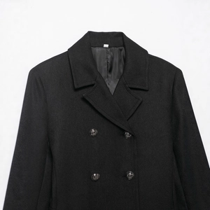 Women's black wool blend double-breasted coat with large lapels and embossed metal buttons