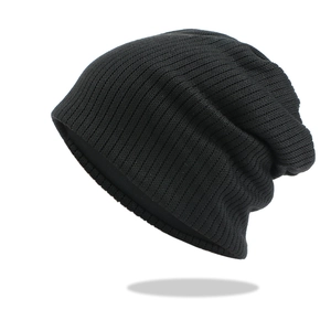 Black ribbed knit beanie for men and women with warm ear protection and elastic finish
