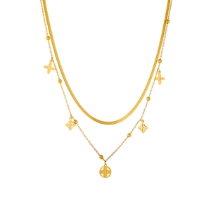 Double layered gold necklace with flower pendants and snake chain on white background