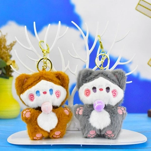 Cute brown and grey plush cat keychains on a white display stand for bag charms