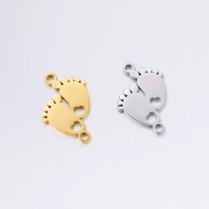 Polished stainless steel double footprint charm with heart cutout in gold and silver