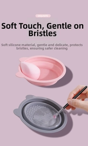 Macro shot of pink and grey foldable silicone bowls for cleaning makeup brushes and sponges