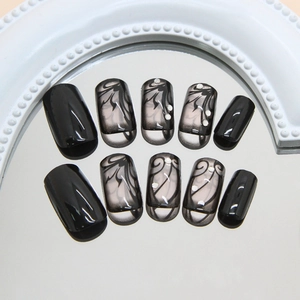 Dark vine press-on nails with sparkling diamonds and black gradient finish, square oval shape
