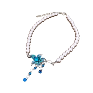 French vintage pearl necklace with a blue crystal flower pendant and tassel