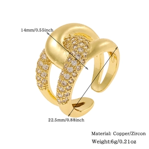 Detail view of twisted gold ring with zircon inlay showing size and weight specs