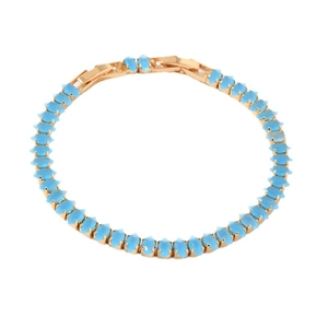Elegant gold bracelet with marquise sky blue cat eye stones and a secure folding clasp