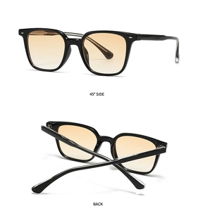 Detail view showing 45-degree side and back fold of black square sunglasses with orange lenses