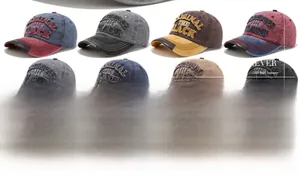 Detailed grid of washed denim baseball caps with 3D embroidery in eight various colors