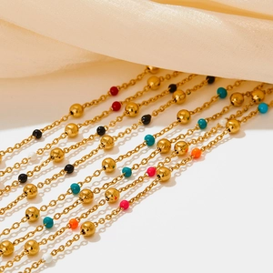 Colorful Bohemian enamel beaded necklace set in gold-tone stainless steel with layers