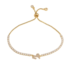 Adjustable gold zodiac bracelet featuring sparkling clear zircon pavé stones and slider clasp