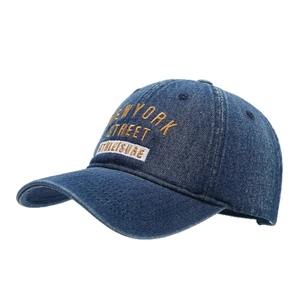 Blue denim baseball cap with New York street embroidery in a stylish side view angle