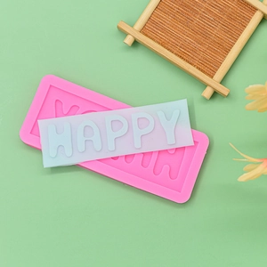 Pink silicone mold for HAPPY letters fondant and clay with 3D gradient resin samples