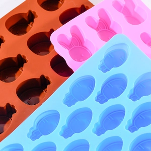 Detail view of silicone molds in rabbit, carrot, and pumpkin shapes for DIY baking