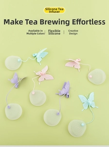 Close-up of butterfly silicone tea infusers in pink, purple and green pastel colors