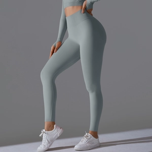 Close-up of high-waist seamless compression yoga leggings with ribbed waistband texture