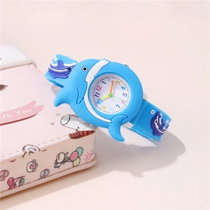 Blue dolphin cartoon kids watch with soft silicone strap on a light pink background