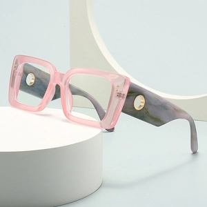 Modern oversized pink translucent sunglasses with marble-textured wide temples