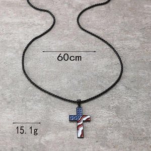 Detail view of USA flag cross pendant with 60cm chain length and 15.1g weight info
