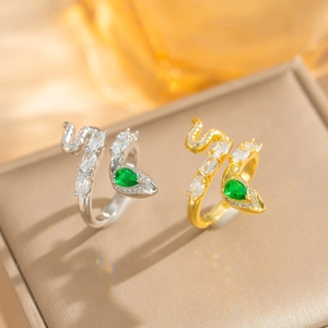 Chic snake-shaped open ring in gold and silver finish with green pear-shaped zircon
