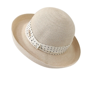 Polka dot Hepburn style straw sun hat with bow and gold Music charm for women