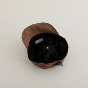 Detail view of brown toddler baseball cap interior with sweatband and adjustable drawstring