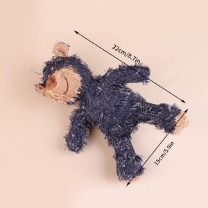 Durable blue denim dog squeaky toy with 22cm x 15cm size guide on a plain background
