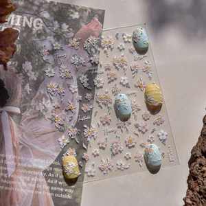 3D embossed nail stickers featuring pink cosmos flowers and stylish handwritten text