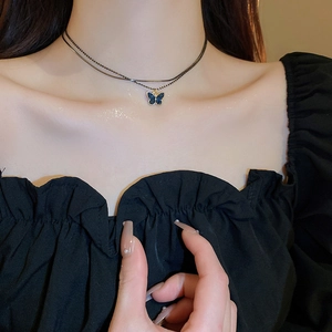 Double-layer choker necklace with blue butterfly pendant on elegant metal chains