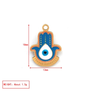 Macro detail of Hamsa Hand and Evil Eye pendant with 18mm height and 13mm width dimensions