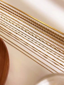Detailed selection of 18K gold plated stainless steel snake and twist chains for layering