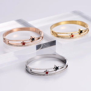Elegant star-shaped cuff bracelet with rhinestones in rose gold, gold, and silver