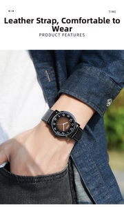 Close-up of GEDI vintage quartz watch with gradient dial and black leather strap on wrist