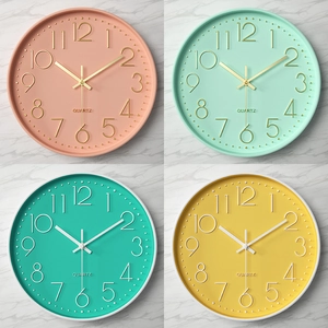 Modern 30cm quartz wall clocks with 3D numbers in pink, mint green, teal, and yellow colors