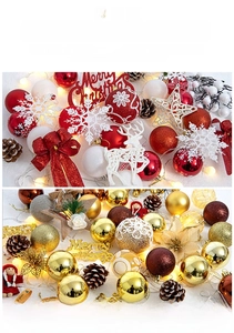 Detail of 60cm mini Christmas tree ornaments with festive LED lights and red bows