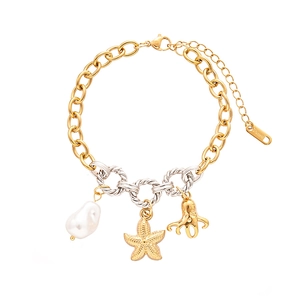 Stainless steel ocean theme bracelet with sea star and octopus charms on gold chain