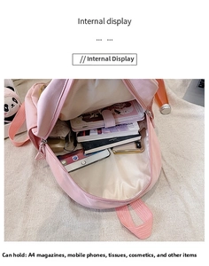 Pink canvas backpack internal view showing large capacity for A4 files and essentials