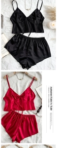 Detail of silk satin camisole set with bow tie and ruffled hem in black and red
