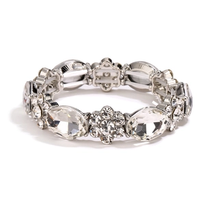 Silver stretch bracelet with oval clear crystals and floral rhinestone modules