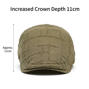Olive green vintage distressed newsboy cap with patchwork plaid detail and 11cm deep fit