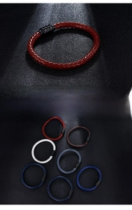 Close-up of men's woven leather bracelets with magnetic stainless steel clasps in multiple colors
