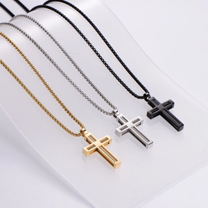 Three minimalist stainless steel spring cross pendant necklaces in gold, silver and black